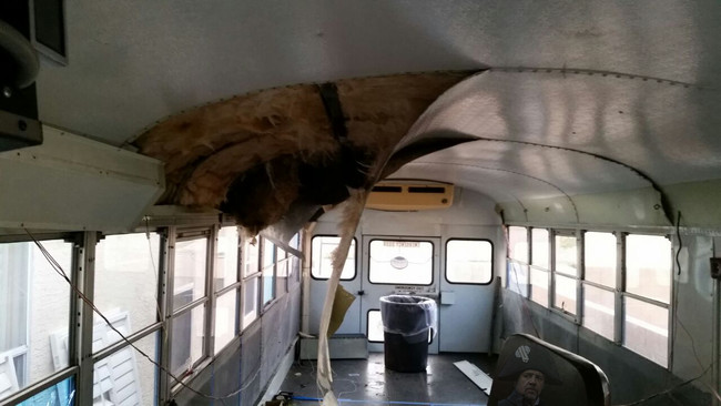 The first order of business was to take care of the roof and ceiling. Most people leave these alone when they convert school buses, but Patrick and his family really wanted to give Big Blue a unique design.