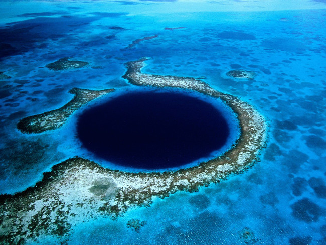 Go below the surface in Belize's Great Blue Hole.