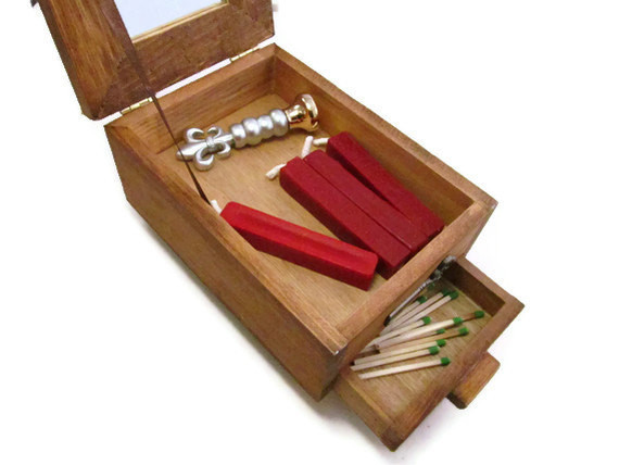 If your friend writes a lot of notes to accompany his or her crafts, this adorable <a href="https://www.etsy.com/listing/198033465/circus-wax-seal-kit?ref=related-3" target="_blank">wax seal kit</a> will blow them away.