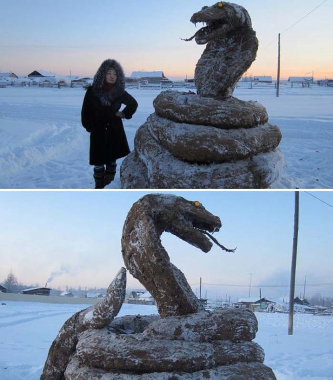 This is a giant snake statue made of frozen poop. I wish I were making that last part up.