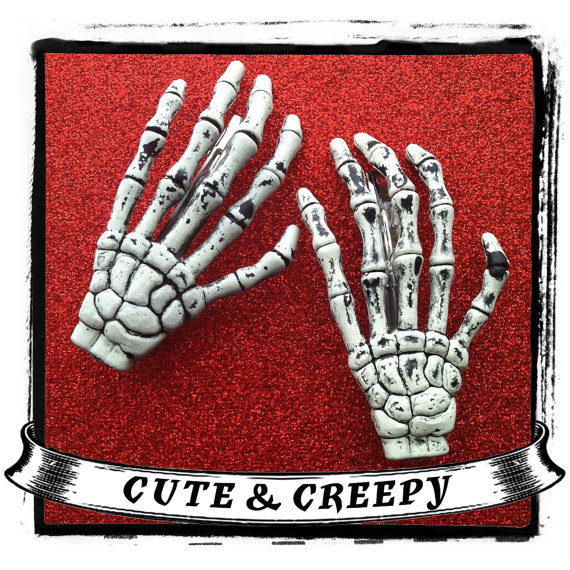 Have a friend of yours close her eyes and clip her hair back with these skeleton hands. Genius!