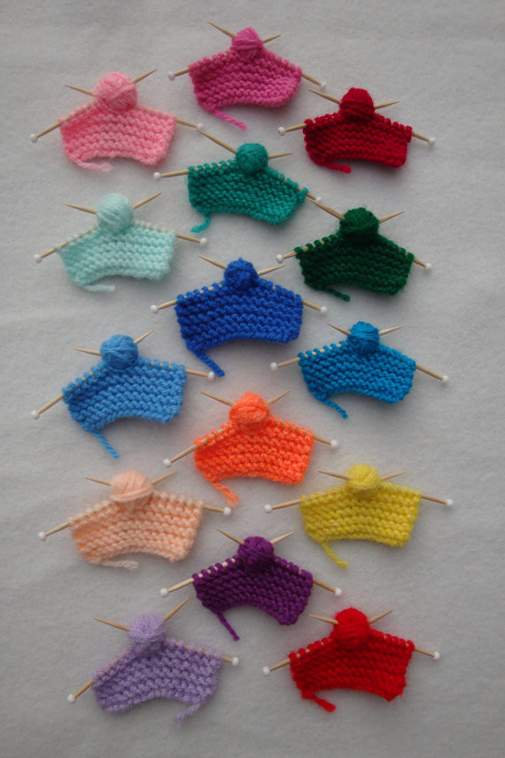 Get an assortment of <a href="https://www.etsy.com/listing/84416466/miniature-knitting-pin-or-magnet?utm_source=Pinterest&amp;utm_medium=Internal&amp;utm_campaign=Merch" target="_blank">a-freaking-dorable magnets</a> for your knitting club.