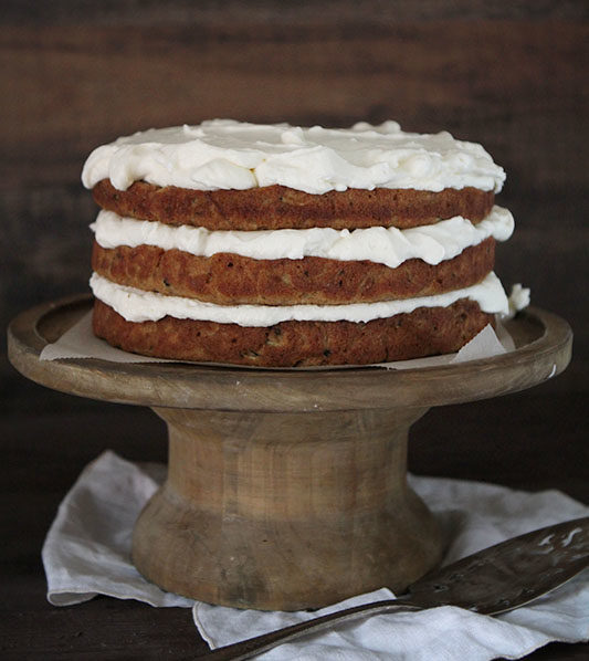 Before you question why this banana cake <a href="http://iambaker.net/zucchini-banana-cake-with-whipped-cream-cheese-frosting/" target="_blank">has zucchini in it</a>, just try it.