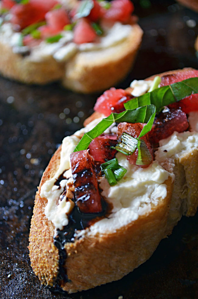 Start your dinner party off right with an appetizing <a href="http://hostthetoast.com/watermelon-bruschetta-with-whipped-feta-basil-and-balsamic-drizzle/" target="_blank">watermelon bruschetta</a>. 