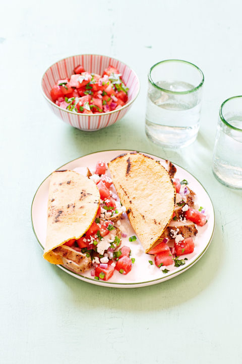 These <a href="http://www.goodhousekeeping.com/food-recipes/g1157/watermelon-recipes/?slide=4" target="_blank">watermelon and chicken tacos</a> will take your favorite summer fruit on a trip south of the border.
