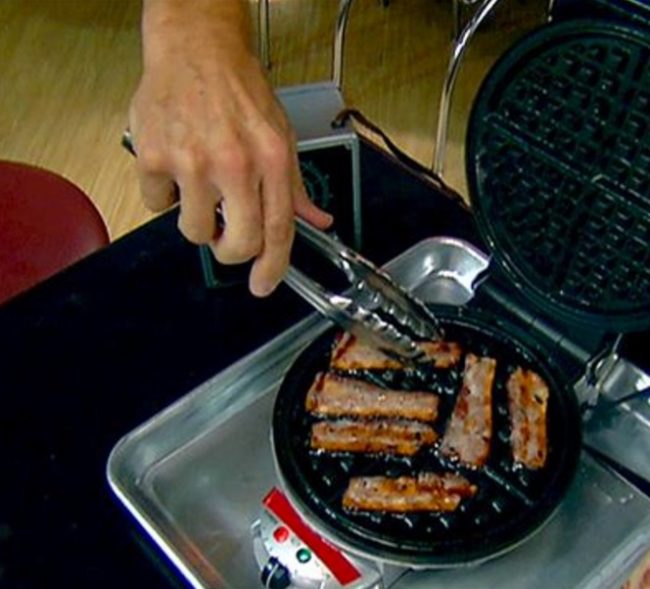 Grill your bacon on a waffle maker.