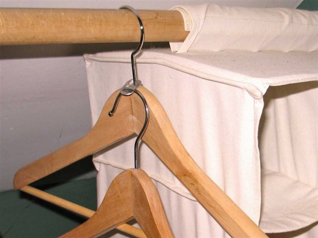 Use a soda can tab to make more room in your closet by attaching another hanger to it.