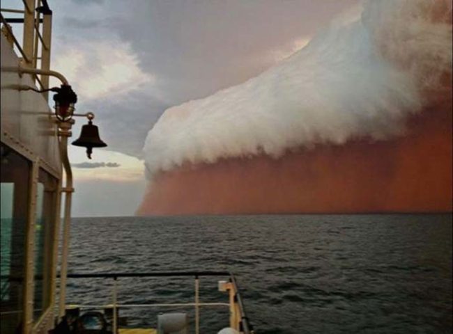 Can you guess what that is? It's a massive dust storm blowing out over the ocean in Australia, because the world is a terrible place.