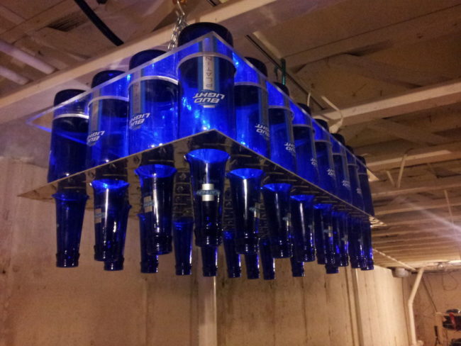 <a href="http://www.instructables.com/id/DIY-Beer-Bottle-Chandelier/?ALLSTEPS" target="_blank">This chandelier</a> is perfect for any man cave.
