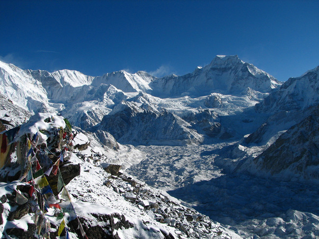 Place a prayer flag in the Himalayas.