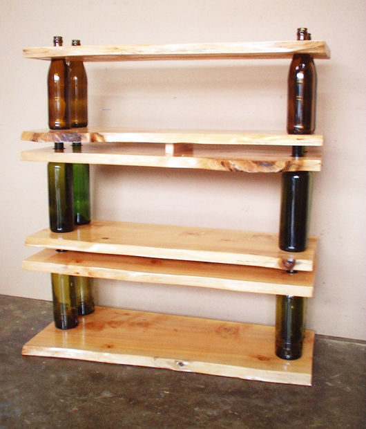 Easily <a href="http://www.instructables.com/id/Ten-Green---modular-shelving/?ALLSTEPS" target="_blank">replace these wine bottles</a> for empty beers to make cool shelves.