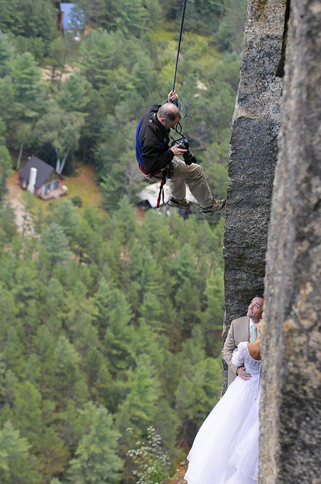 The photographer and his talented team are climbing experts, so each client is safely and cleverly strapped in so that they're always safe. "We're probably at greater risk driving to and from the session than we are when we're hanging cliffside," he writes.
