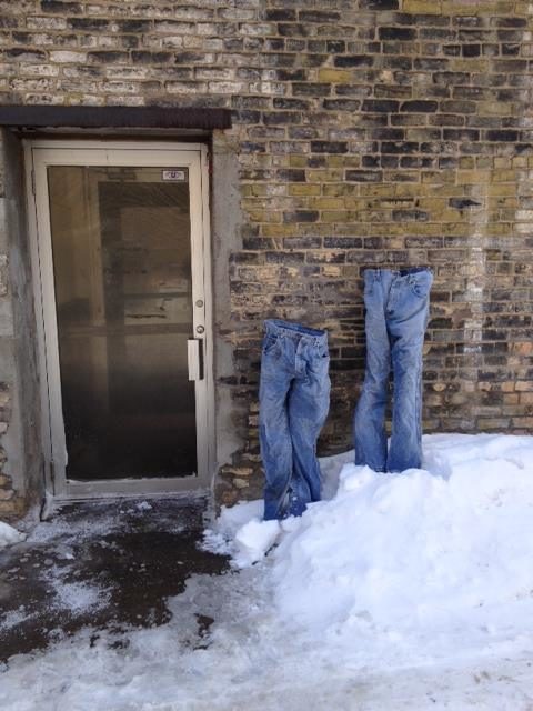 The jeans were first soaked in water and manipulated into looking like they had legs inside. That's where the freezing temperatures came into play.
