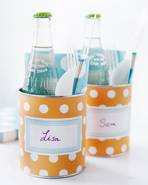 Stuff cans with <a href="http://www.sweetpaulmag.com/crafts/picnic-place-settings" target="_blank">place settings for a picnic</a> in the park or at the beach.