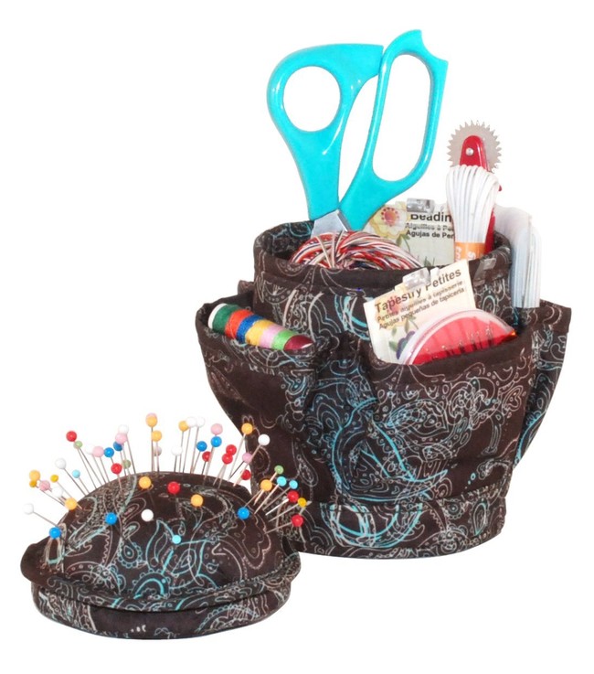 This <a href="http://www.amazon.com/Everything-Mary-Desktop-Cushion-Chocolate/dp/B00U7CU7LS/?_encoding=UTF8&amp;tag=vira0d-20" target="_blank">desktop sewing organizer</a> is all your favorite sewer will ever need. 