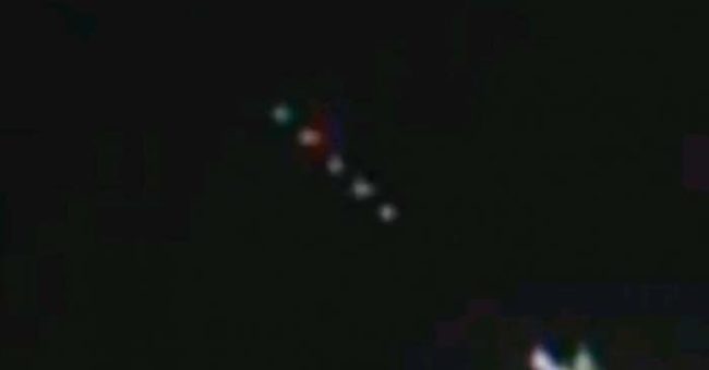 While this maneuver took a little longer, it was ultimately successful. All the while, NASA's cameras were rolling, and they captured something weird lurking in the background. What could these orbs possibly be?