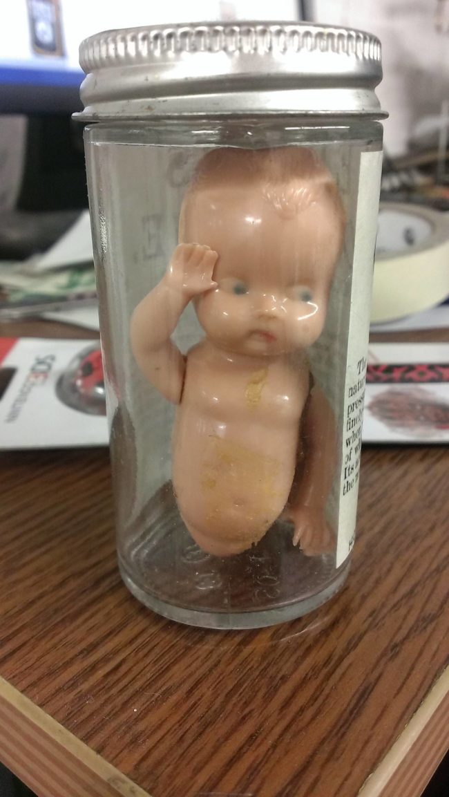 A legless baby in a jar for when your nativity scene needs more edge and fewer limbs.