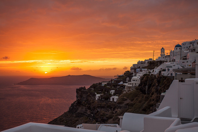 See a sunset on Santorini.