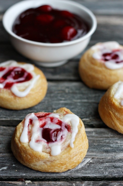 These <a href="http://notyourmommascookie.com/2013/04/easy-cherry-danish/" target="_blank">cherry danishes</a> will transport you to Denmark -- no flight required.