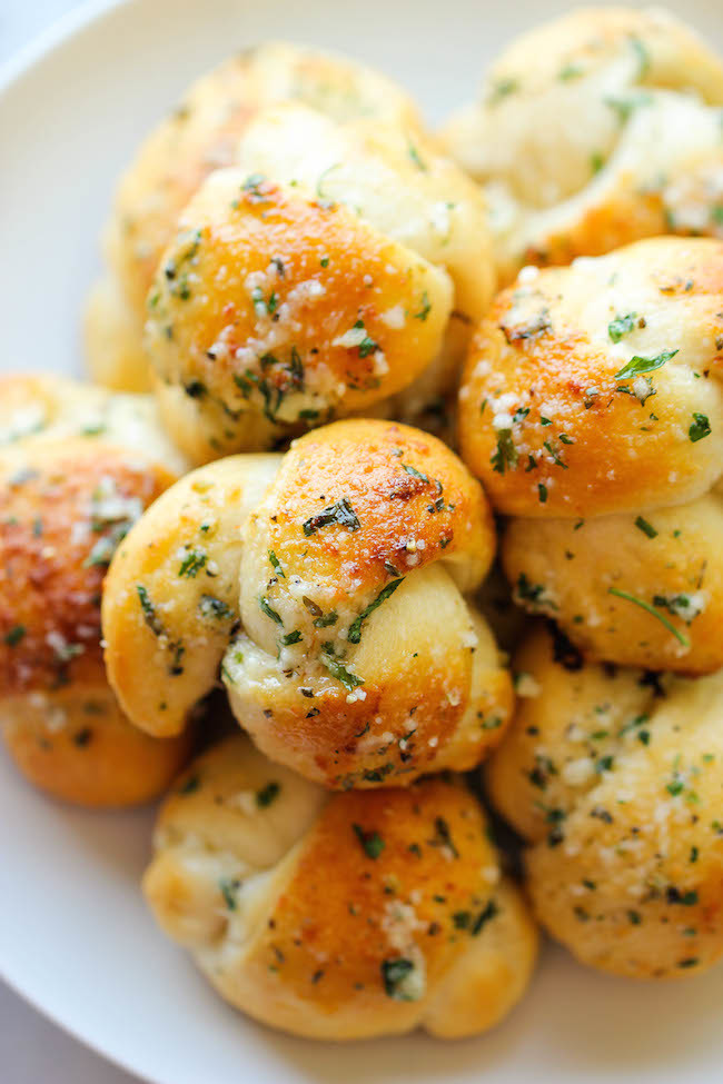 These <a href="http://damndelicious.net/2014/04/14/easy-garlic-parmesan-knots/" target="_blank">garlic parmesan knots</a> couldn't be more mouthwateringly handsome. 