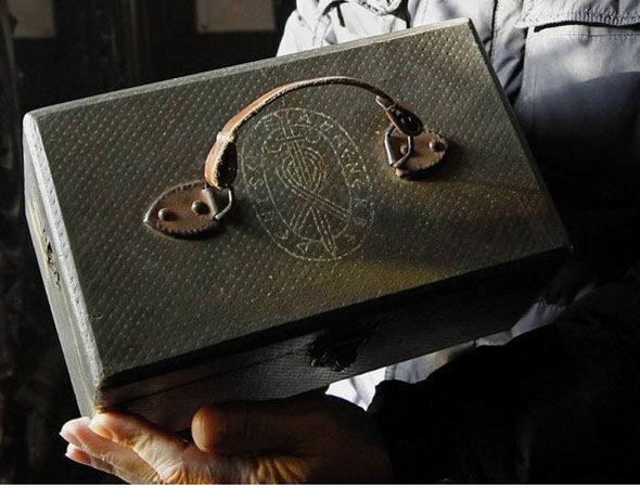 But it wasn't until recently that conspiracy theorists tied these skulls to the Nazis. This briefcase was recently found by a hermit near the cave, and it's decorated with the symbol of the SS Ahnenerbe.