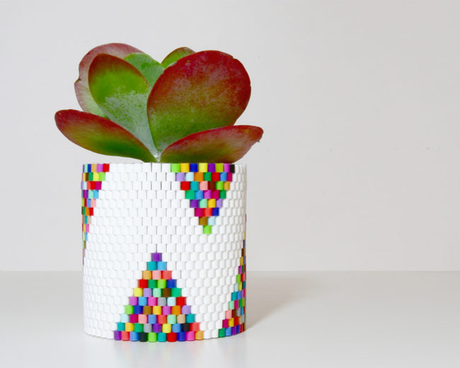 No one will know this <a href="https://the3rsblog.wordpress.com/2014/04/17/woven-bead-planter/" target="_blank">adorable planter</a> is made from an old soup can!