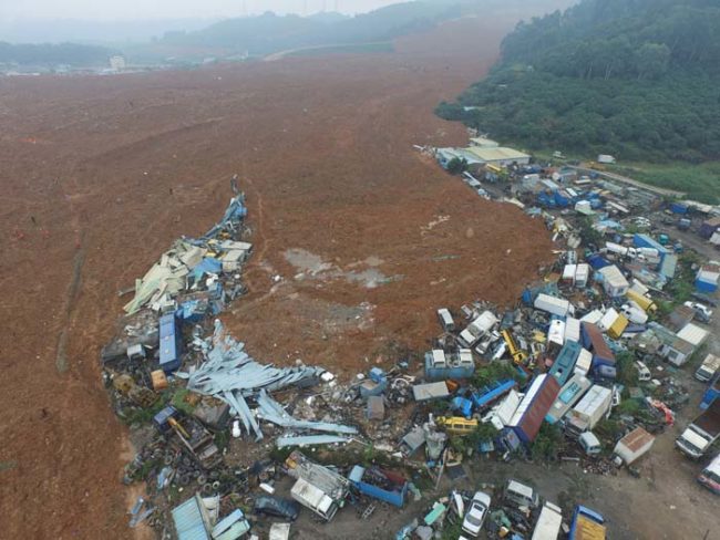 Despite a number of safety warnings from officials, the business park was allowed to keep and maintain the debris pile for years.