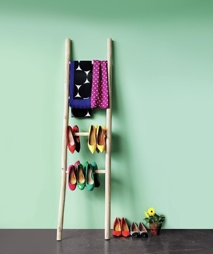 For a rustic look, an old ladder can hold your heels, scarves, and other clothing items.
