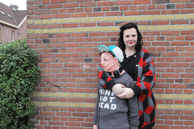 Here is Marieke and a knitted representation of her child.