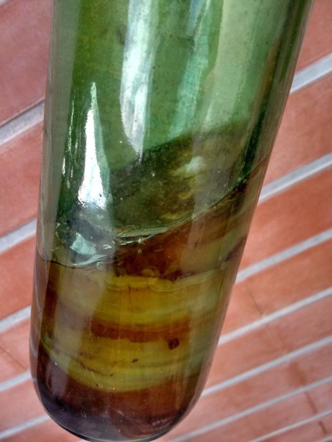 It looks like the fermented liquor eventually solidified into layers of material. 