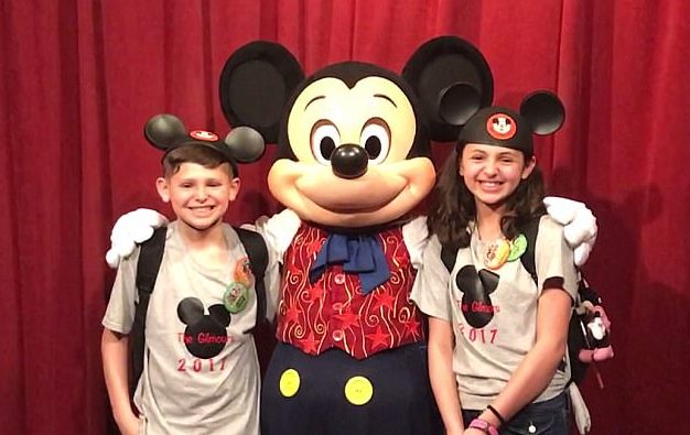Janielle and Elijah went to an autograph signing with Mickey. He pulled them in close for pictures and performed a few card tricks.