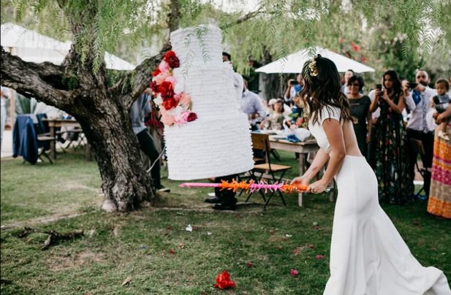 They filled the pinata with tiny bottles of booze, candy, and chips. Obviously, everyone was thrilled.